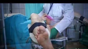 Two orgasms of the patient on the gynecological chair